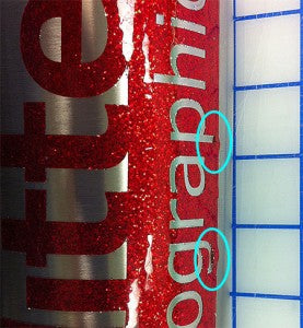 FIG 5: Edge Lifting here is caused by the metalized face film and too large a decal.