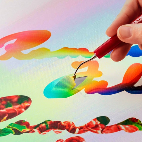 Weeding vinyl with a tool from SignWarehouse